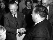 Professor Carl Schmidt congratulates the new Chancellor Konrad Ade- Old Photo
