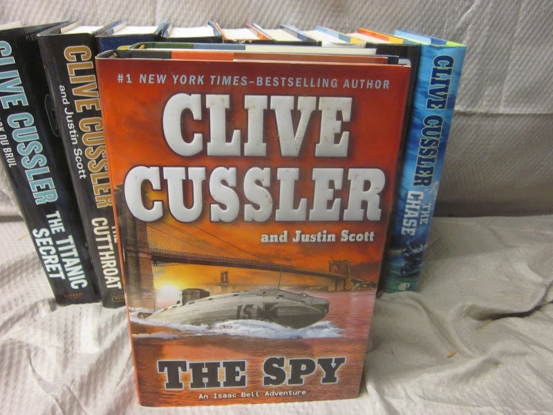 Lot of 12 Clive Cussler Novels Hardcover Books - Isaac Bell Series - Image 3 of 4