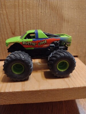 HW  MONSTER JAM TRUCK: BUSTIN' LOOSE   METAL BASE SMALL WHEELS   1/64 . HWL4