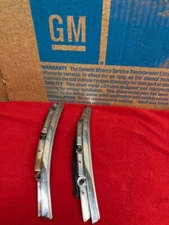 1969 Impala Upper L/R  rear fender stainless molding with rubber seal.