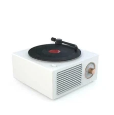 Bluetooth Speaker in the Form of a Turntable. It Turns When The Music Is Played 