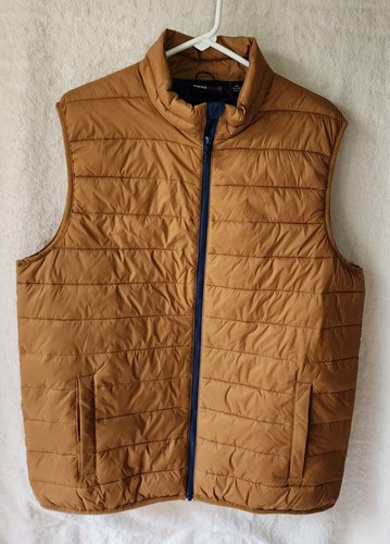 rust colored puffer vest