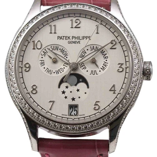 Patek Philippe — PATEK PHILIPPE 4947g - Annual Calendar with Moonphase in White Gold