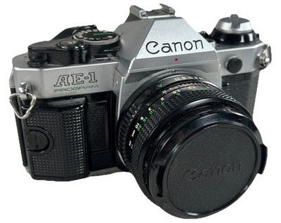 Canon AE-1 Program 35mm SLR Film Camera Lot Manuals Flash Lenses Cases Tested EC
