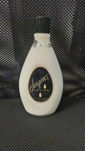Vintage Jergens Lotion Glass Bottle 8" tall.