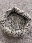 Leopard Print Cat Bed With Assorted Cat Toys — photo 3