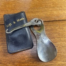 A vintage Metal shoe horn and button hook set - 1950s