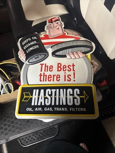 vintage  auto  parts store  hastings oil gas trans  plastic sign and two  books