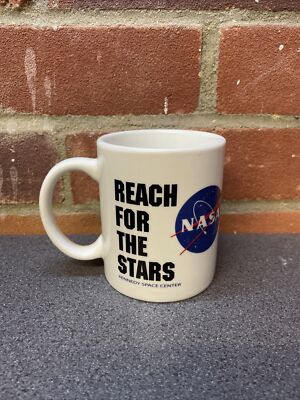 NASA KENNEDY SPACE CENTER Reach For The Stars Kaffeebecher Tasse Keramik Logo