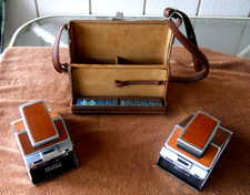 2 vintage Polaroid sx-70 land cameras with case  Brochure