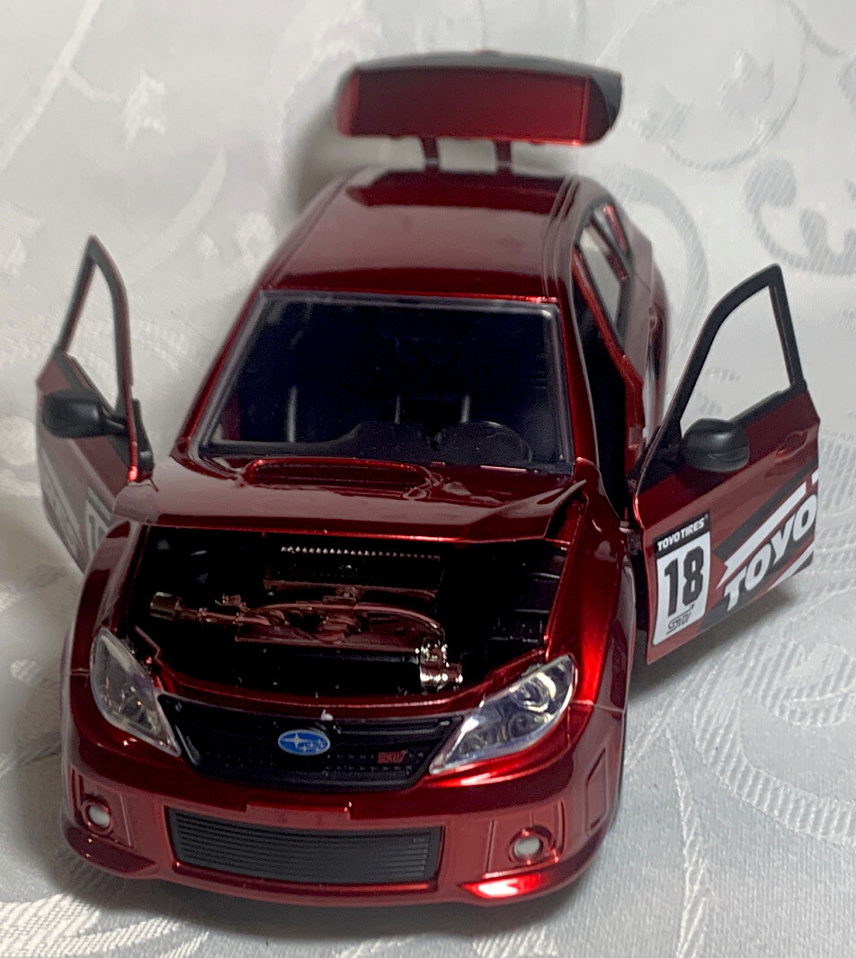 ミニカー JDM TUNERS 2012 SUBARU IMPREZA WRX STI JDM TUNERS: 2012 Subaru Impreza WRX STI 1/24 Scale (Candy