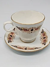 Vintage  Crown Staffordshire Fine Bone China Footed, Scalloped Edge Tea Cup & Sa