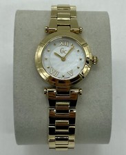 Guess Collection Mother of Pearl roman Dial Women's gold tone Watch Y07008L1
