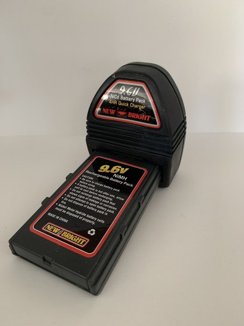 New Bright RC Vehicle 9.6V NiCd 4hr Battery Charger With Battery | eBay
