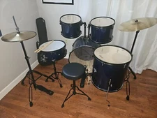 Ashthorpe full blue drum set, set up but never used before. Originally $370