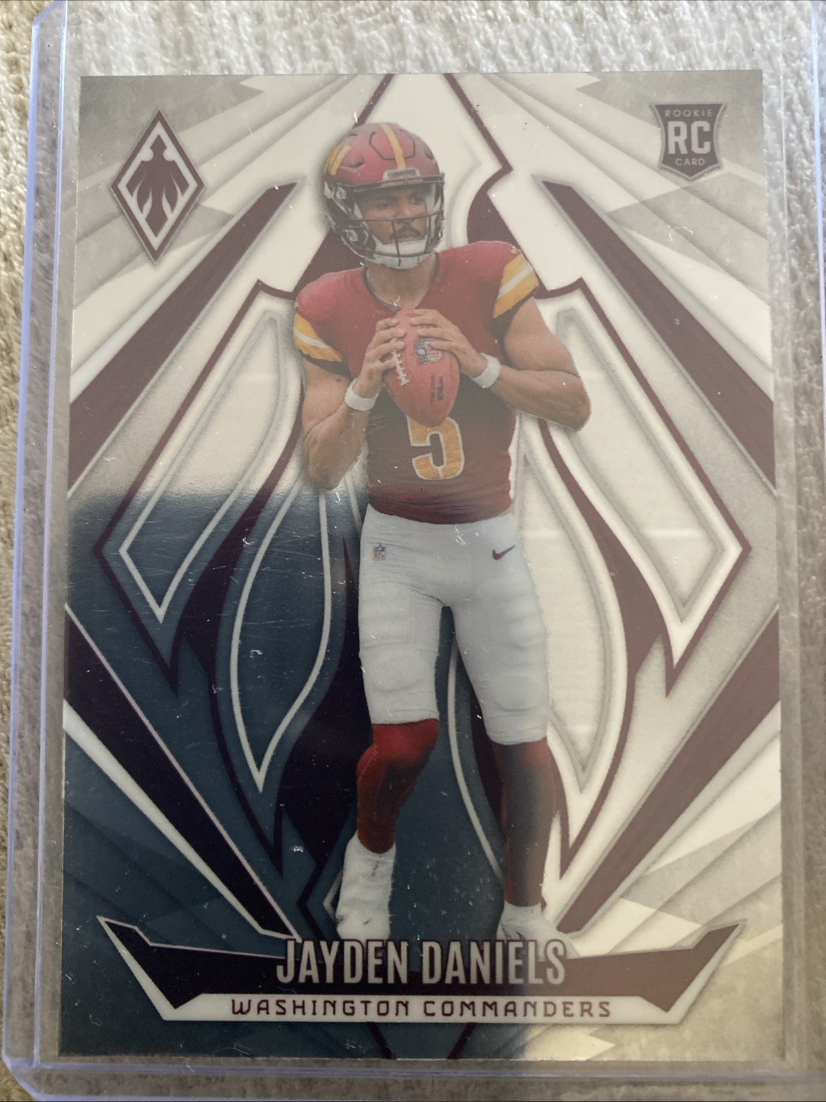 2024 Panini Phoenix - Rookies Jayden Daniels #198 Silver (RC)