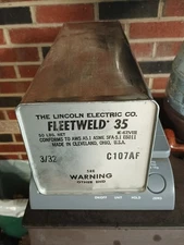 LINCOLN ELECTRIC FLEETWELD 35 3/32 in x 14 in 50 lb Can OPENED Weight is 15 Lbs
