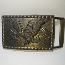 Vintage American Bald Eagle Brass Belt Buckle Flying Over Mountains Western USA