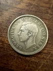 1944 George VI Sixpence — photo from another recent sale