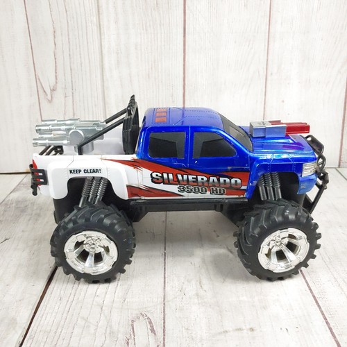 Descatalogado - Camión máquina de batalla Jada RC Silverado 3500 HD - PROBADO FUNCIONANDO - Imagen 7 de 14