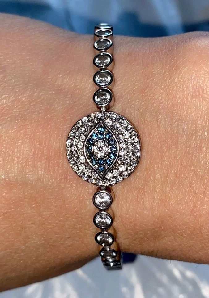 "Brazalete Joan Boyce Cristal Transparente y Azul 'Ángel' Mal de Ojo Tono Plata Bisel 7-8""" Foto 2 de 4