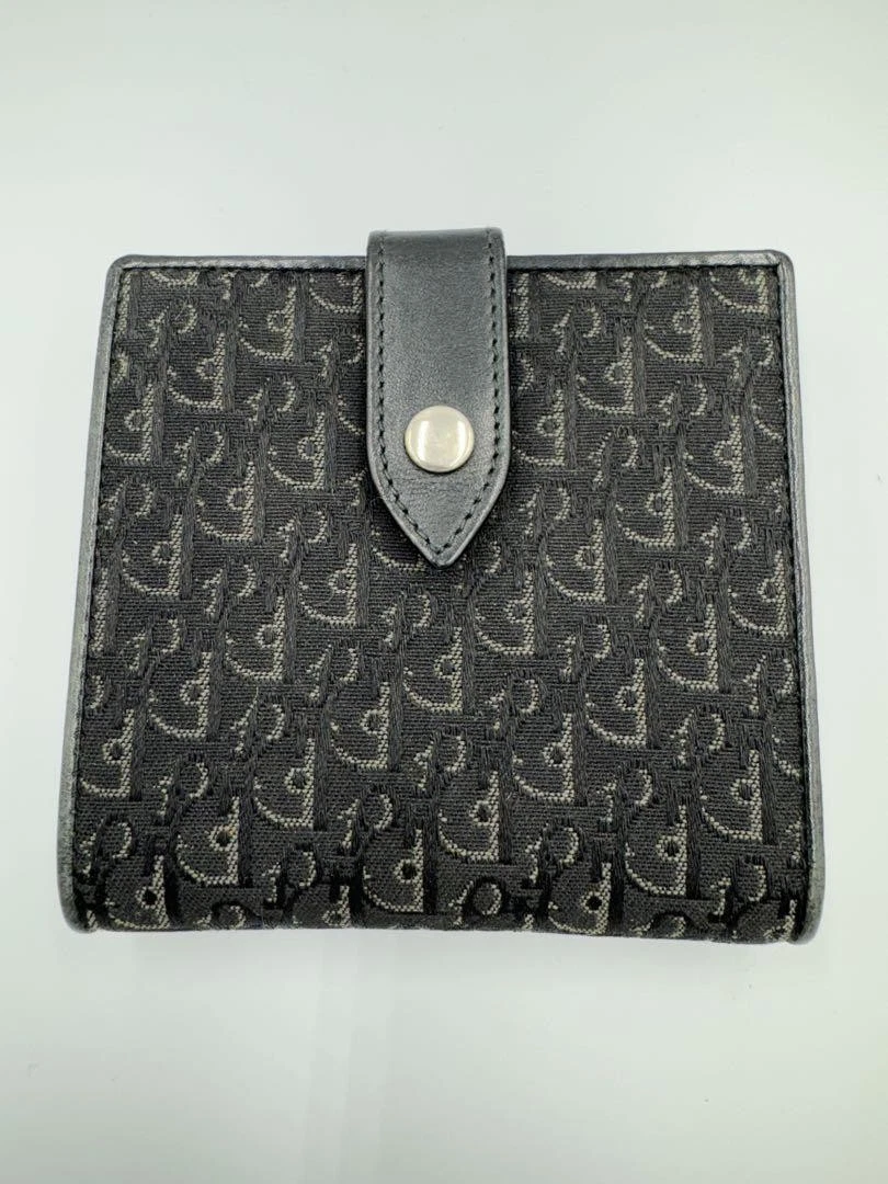 Authentique portefeuille Christian Dior Trotter bi pli bon état