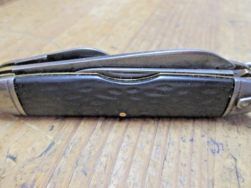 A genuine Camillus multi-tool made in New York USA — a storied American blade brand that went bankrupt in 2007, making survivors like this a real collectible find.