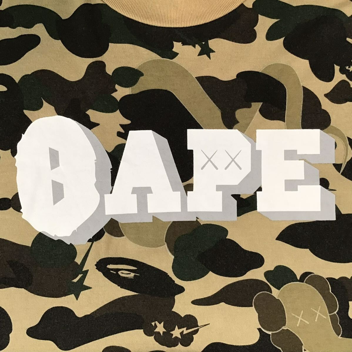 APE BAPE KAWS 1st Camo カレッジロゴ　ロンt tシャツ　s APE BAPE KAWS 1st Camo カレッジロゴ ロンt tシャツ s トップス