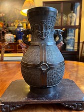 A Chinese Qing Dynasty Bronze Lion Vase, Marked