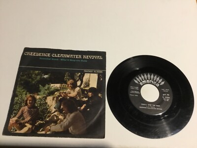 (stra) 45 Umdrehungen CREEDENCE CLEARWATER REVIVAL Travelin Band. Who ll stop the rain
