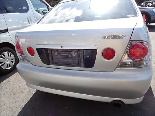 TOYOTA ALTEZZA OEM OPTIONAL REAR License Plate GARNISH LEXUS IS200 IS300 SXE10 - Picture 2 of 5