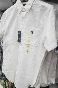 white polo short sleeve button up