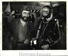 1984 Press Photo Jean Michel Cousteau with a diver mannequin at DEMA trade show