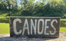 Letrero de madera primitivo de canoas camping casa de lago campamento río cabaña cabaña albergue