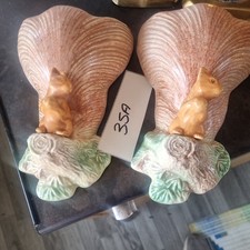 a pair ofVintage Sylvac Ceramic Squirrel Wall Pocket Vase 2593