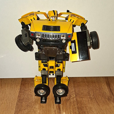 Roadbot Hummer H2 Transformer Roboter Gelb Simba / Happy Well Figur