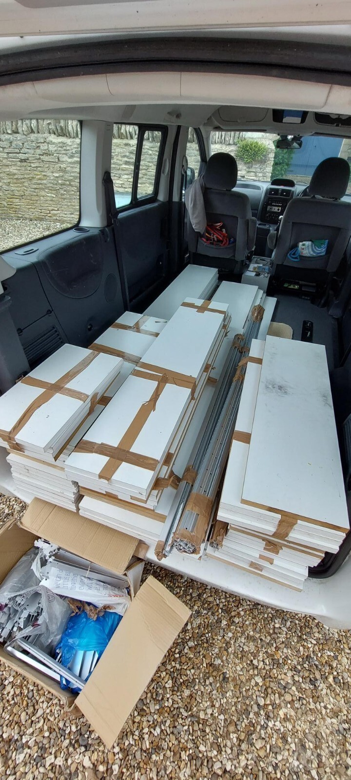 Wall mounted adjustable aluminium spur shelving with laminate shelves