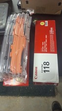 2 CANON 118 LASER TONER CARTRIDGES, 1 OUT OF THE BOX BUT STILL SEALED YELLOW