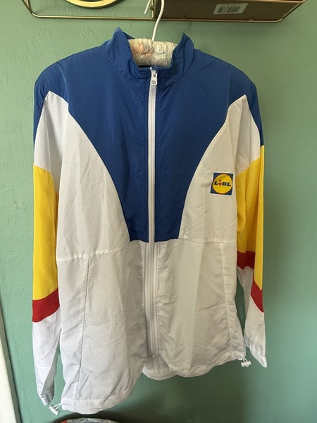 Chaqueta cortavientos Lidl Crivit Festival edición limitada talla mediana nueva con etiquetas