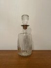 Vintage glass decanter with stopper, embossed ribbed clear glass bottle — photo 1