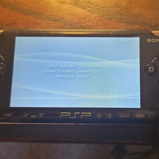 Sony PSP 1004 Black Console - For Parts / Repair - Turns On - Broken UMD