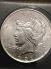 1922 $1 Peace Dollar in capsule
