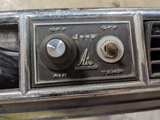 Early Jeep CJ Wagoneer With "Jeep" Labeled Face Under Dash Air Conditioner Unit