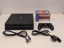 Sony PlayStation 4 Pro (PS4 Pro) 1TB Console with Controller and 7 Games