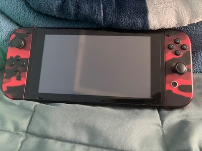 Nintendo switch With games and pro controller and headset black and red controll