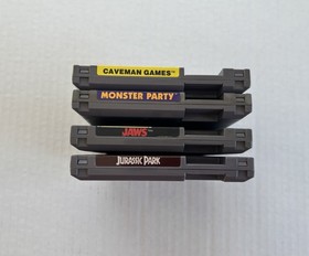 Nintendo NES 4 game lot - Caveman Games, Monster Party, Jaws, Jurassic Park