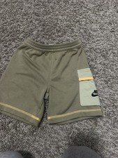 Nike Kids Shorts with Visible Stitching in a green/olive color. Size M 5-6yrs
