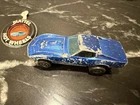 Vintage Hot Wheels Redline 1967 Custom Corvette blue diecast car With Button