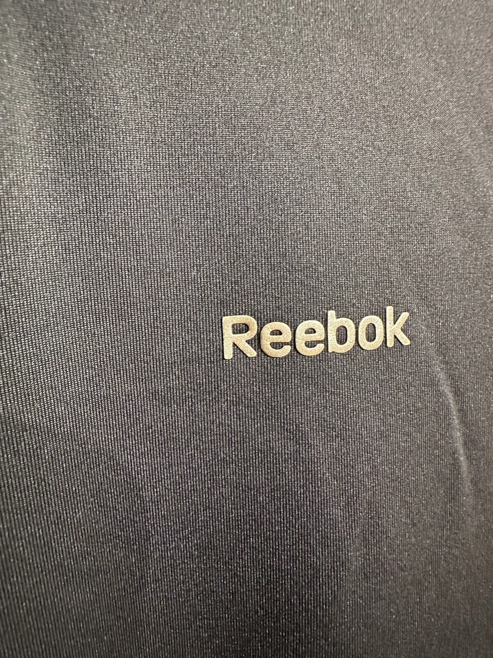 Pullover deportivo Reebok para mujer con cremallera en cuarto negro talla grande Foto 4 de 4