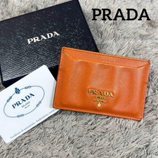 Estuche para tarjetas y pasaportes PRADA cuero saffiano naranja
